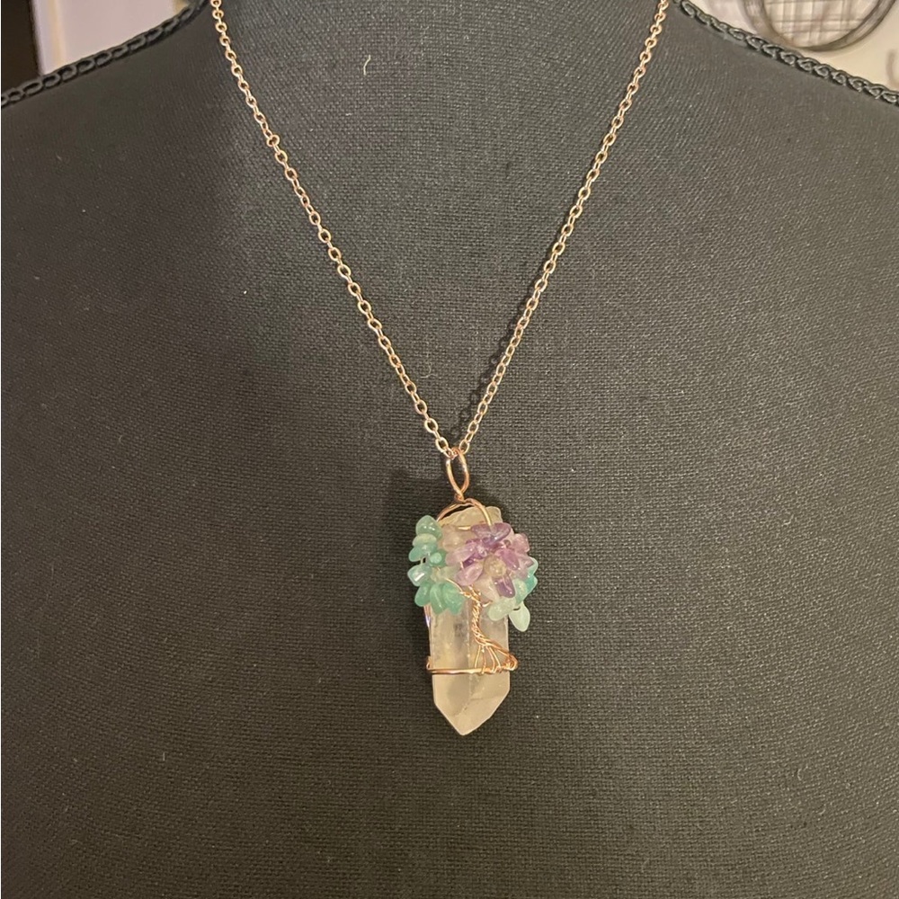Clear quartz wrapped in a magical tree.